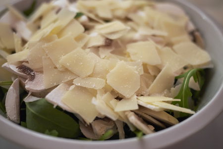 Mushroom salad with parmesan cheese and rocketの写真素材