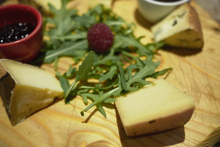 Assorted cheese plate with preservesの写真素材