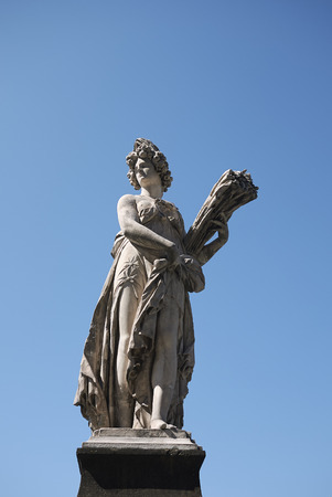 Firenze, Italy - June 21, 2018 : Statue of Summer by Giovanni Caccini at Ponte Santa Trinita (Holy Trinity Bridge), the oldest elliptic arch bridge in the world.のeditorial素材