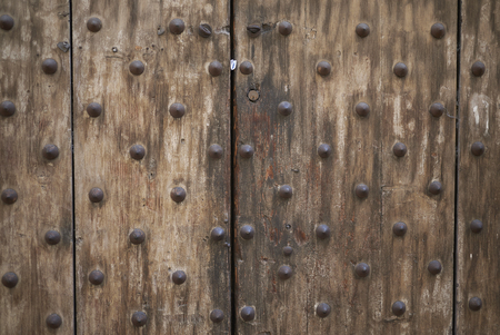 Firenze, Italy - June 21, 2018 : Detail of a wood entrance doorのeditorial素材