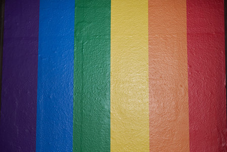Milan, Italy - July 11, 2018 : Rainbow flag wallpaper at Porta venezia underground station