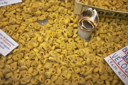 Bologna, Italy - February 02, 2019 : Raw tortellini in a delicatessen shopのeditorial素材
