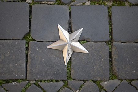 Roma, Italy - February 09, 2019 : Silver star in the pavementのeditorial素材