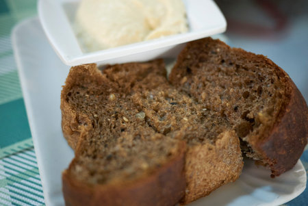 Whole bread slice and hummusの写真素材