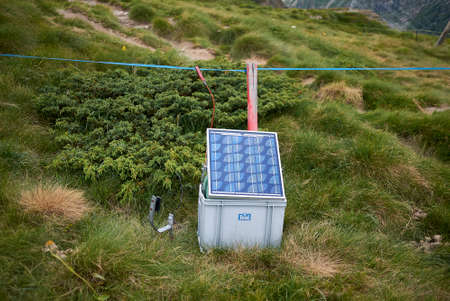 Alp Grum, Switzerland - July 21, 2020: Photovoltaic panel for electric fence at Alp Grumのeditorial素材