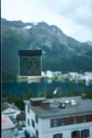 Digital thermometer on a windowの写真素材