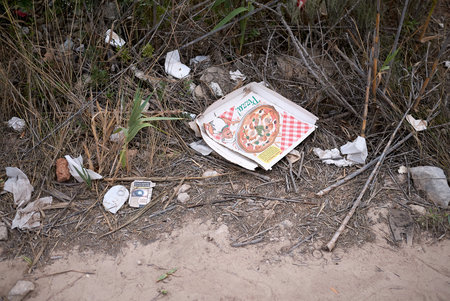 Torre Colimena, Italy - September 02, 2020: View of garbage at Salina dei Monaci natural reserve