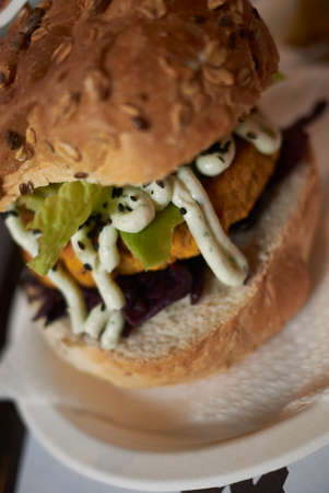 Vegetarian burger with red cabbage and lime mayoの写真素材