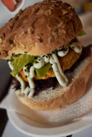 Vegetarian burger with red cabbage and lime mayoの写真素材