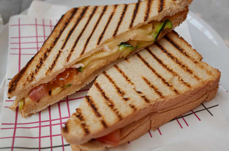 Vegetarian sandwiches with cheese, avocado and tomatoの写真素材