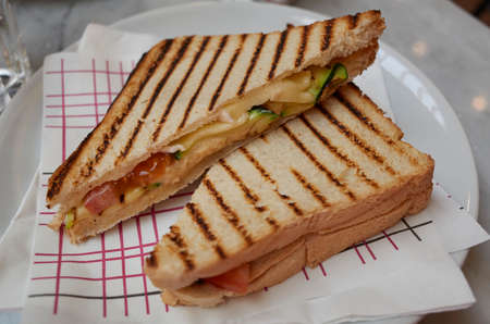 Vegetarian sandwiches with cheese, avocado and tomatoの写真素材