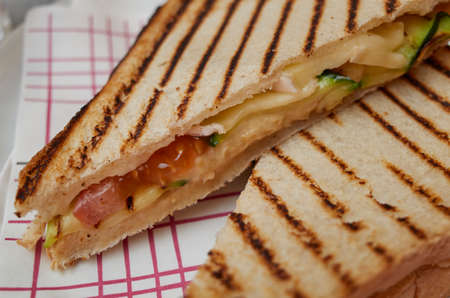 Vegetarian sandwiches with cheese, avocado and tomatoの写真素材