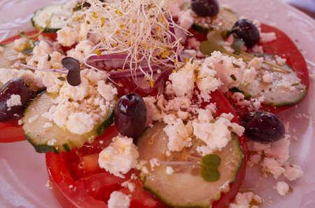 Greek salad with feta cheese, cucumber and tomatoesの写真素材