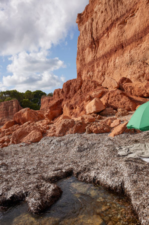 Ibiza, Spain - August 27, 2022 : View of Sa Caleta beachの写真素材