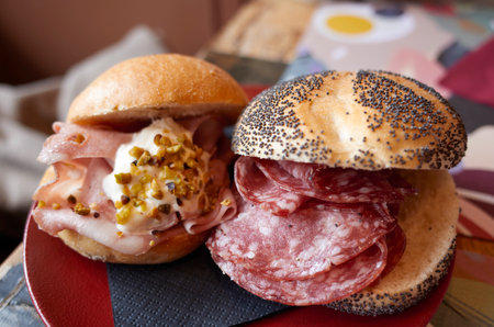 Sandwich with salami and mortadellaの写真素材