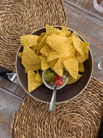 Nachos with guacamole and onionsの写真素材