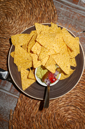Nachos with guacamole and onionsの写真素材