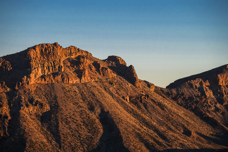 desert mountain in tenerife on el teide vulcan to enjoy your trekking vacation. warm colors sunset on rocks mountainの写真素材