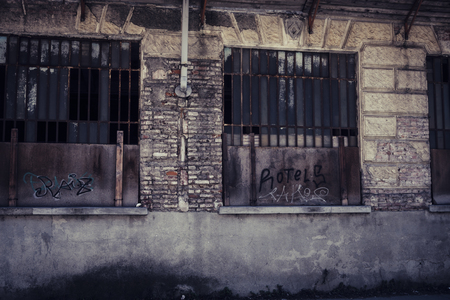 nobody in abandoned place in town. retro dark horror filter and concept. zombie movie style for scary scene.の写真素材