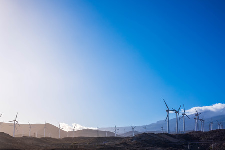 Clean blue sky in beautiful nature concept tiwh clean energy production with wind farm. Tenerife. Modernity conceptの写真素材
