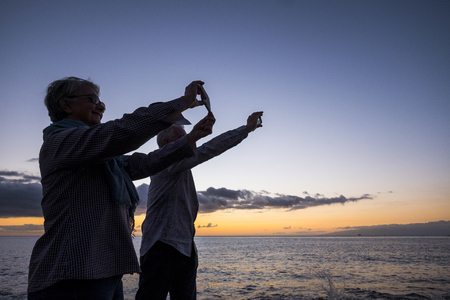 senior couple looking at cameraの写真素材
