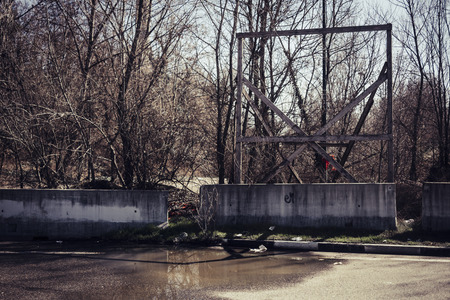 nobody in abandoned place in town. retro dark horror filter and concept. zombie movie style for scary scene.の写真素材