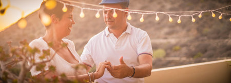 panoramic image with middle age young couple caucasian people having fun dancing in romantic way at...