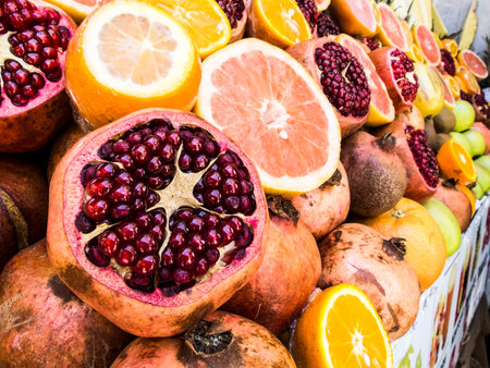 Flea market on the road with lot of fruits exposed ready to be sold and eat - seasonal food at the...