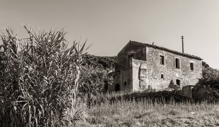 Beautiful Scenery with an Abandoned Old Country House, Caltanissetta, Sicily, Italy, Europeの写真素材