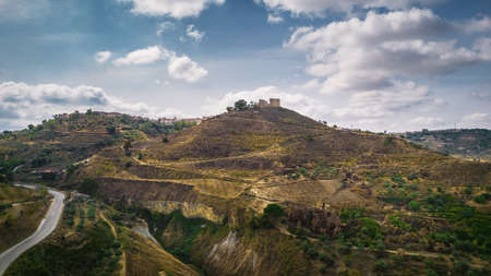 Panorama of Mazzarino with the Medieval Castle in the Foreground, Caltanissetta, Sicily, Italy, Europeの写真素材