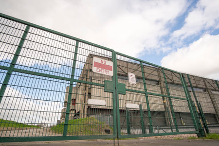 Locked gates at the now demolished and cleared site of the Imperial Brands factory in Nottingham, UKの写真素材