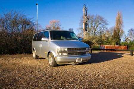 Classic Chevrolet people carrier in a car park.のeditorial素材