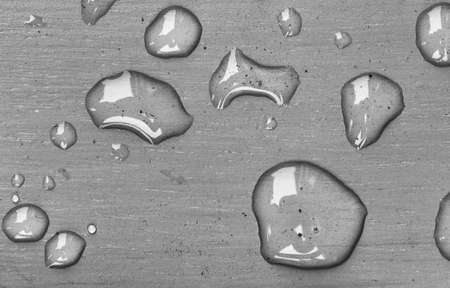 Beads of water under surface tensionの写真素材