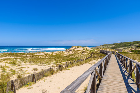 Foot bridge at Cala Mesquida - beautiful coast of island Mallorca, Spainの写真素材