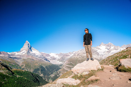 Matterhorn - Hiker in beautiful landscape of Zermatt, Switzerland