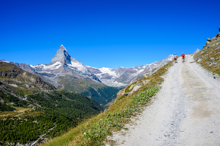 Matterhorn - Hiker in beautiful landscape of Zermatt, Switzerlandの写真素材