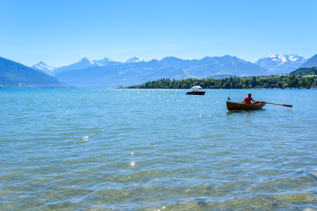 Thuner lake at Thun with beautiful panorama view to mountain scenery - Switzerlandのeditorial素材