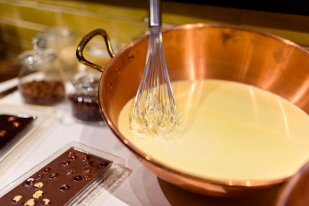 Chocolate preparation -  making chocolate in the kitchenの写真素材
