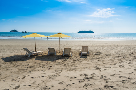 Parasol with chairs at Playa Espadilla at Manuel Antonio Park - Costa Ricaの写真素材