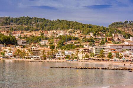 Puerto de Soller, Port of Mallorca island in balearic islands, Spain. Beautiful  beach and bay with boats in clear blue water of summer day.の写真素材
