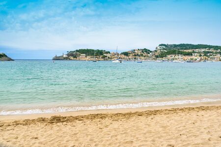 Puerto de Soller, Port of Mallorca island in balearic islands, Spain. Beautiful  beach and bay with boats in clear blue water of summer day.の写真素材