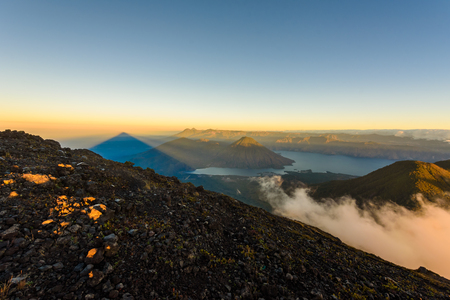 Panorama view of Lake Atitlan and volcano San Pedro early in the morning from peak of volcano Atitlan, Guatemalaの写真素材