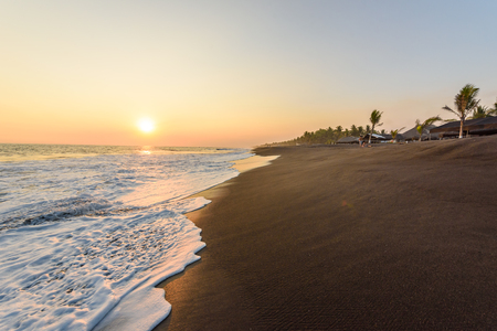 Sunset at Beach with Black Sand in Monterrico, Guatemala. Monterrico is situated on the Pacific coast in the department of Santa Rosa. Known for its volcanic black sand beaches and annual influx of sea turtles. Travel destination of Guatemala.のeditorial素材