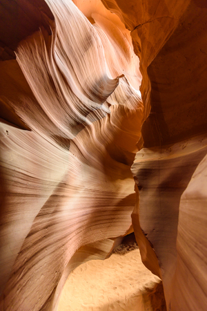 Small Path through Upper Antelope Canyon. Natural rock formation in beautiful colors. Beautiful wide angle view of amazing sandstone formations. Near Page at Lake Powell, Arizona, USAの写真素材