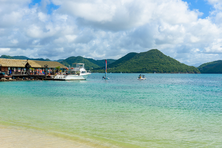 Pigeon Island Beach - tropical coast on the Caribbean island of St. Lucia. It is a paradise destination with a white sand beach and turquoiuse sea.のeditorial素材