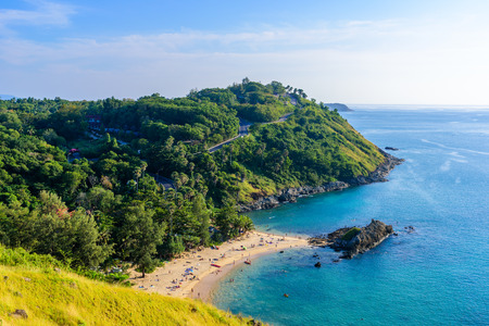 Sunset over Promthep Cape and Yanui beach. Tropical coast with paradise beaches on Phuket, Thailand.の写真素材