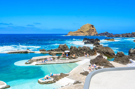 Natural volcanic swimming lagoon pools at Porto Moniz, travel destination for vacation, Madeira island, Portugalの写真素材