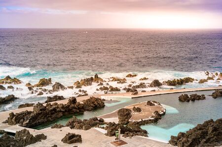 Natural volcanic swimming lagoon pools at Porto Moniz, travel destination for vacation, Madeira island, Portugalの写真素材