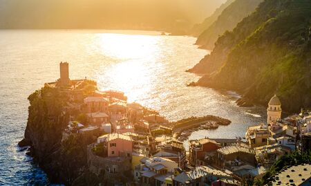 Vernazza - Village of Cinque Terre National Park at Coast of Italy. Beautiful colors at sunset. Province of La Spezia, Liguria, in the north of Italy - Travel destination and attraction in Europe.の写真素材