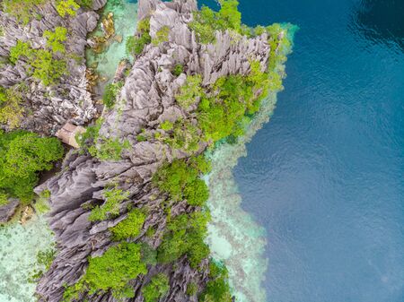 Aerial view of Twin Lagoon on paradise island with sharp limestone rocks, tropical travel destination - Coron, Palawan, Philippines.の写真素材